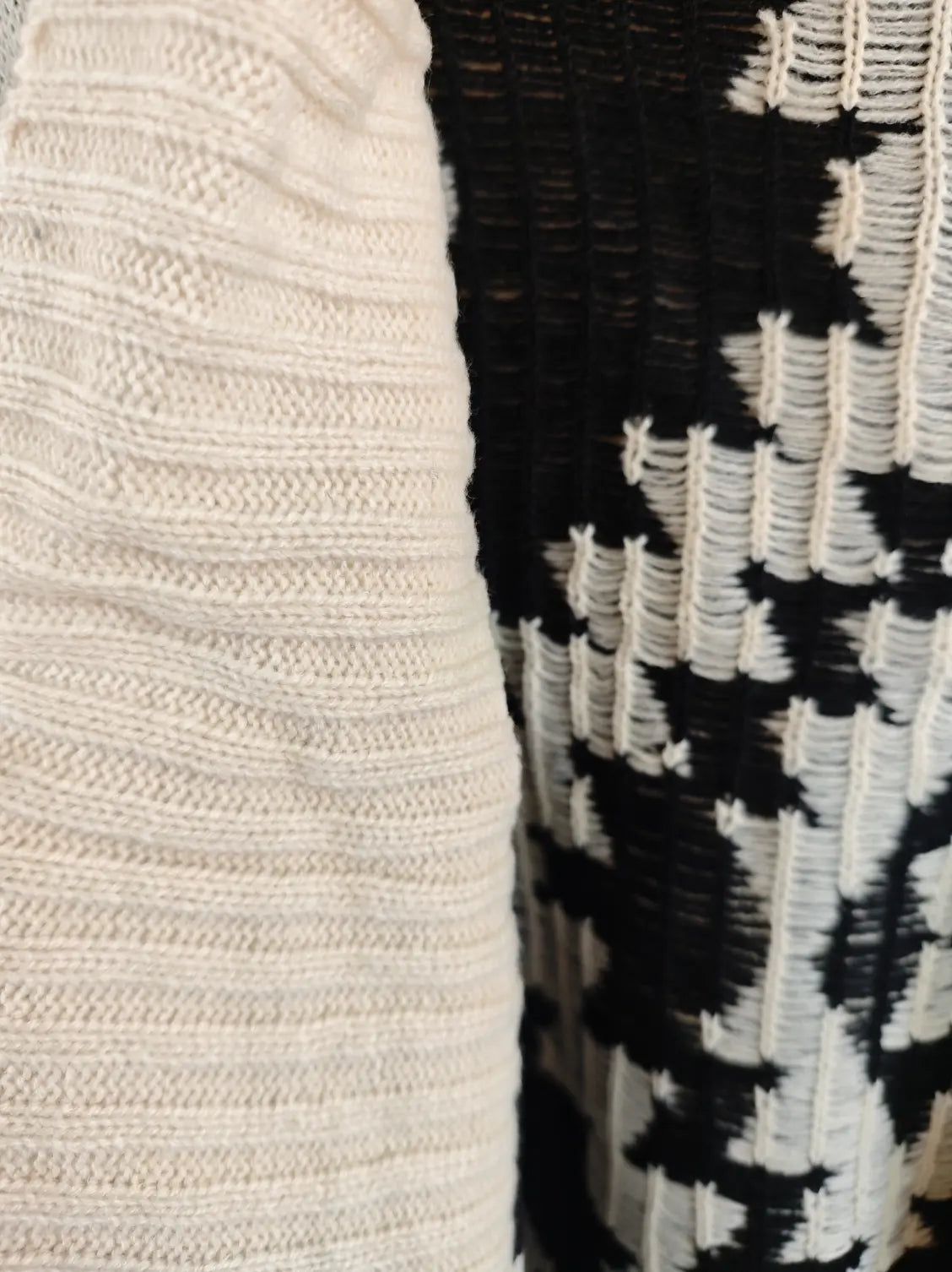 Close-up of shawl collar ribbing and geometric pattern