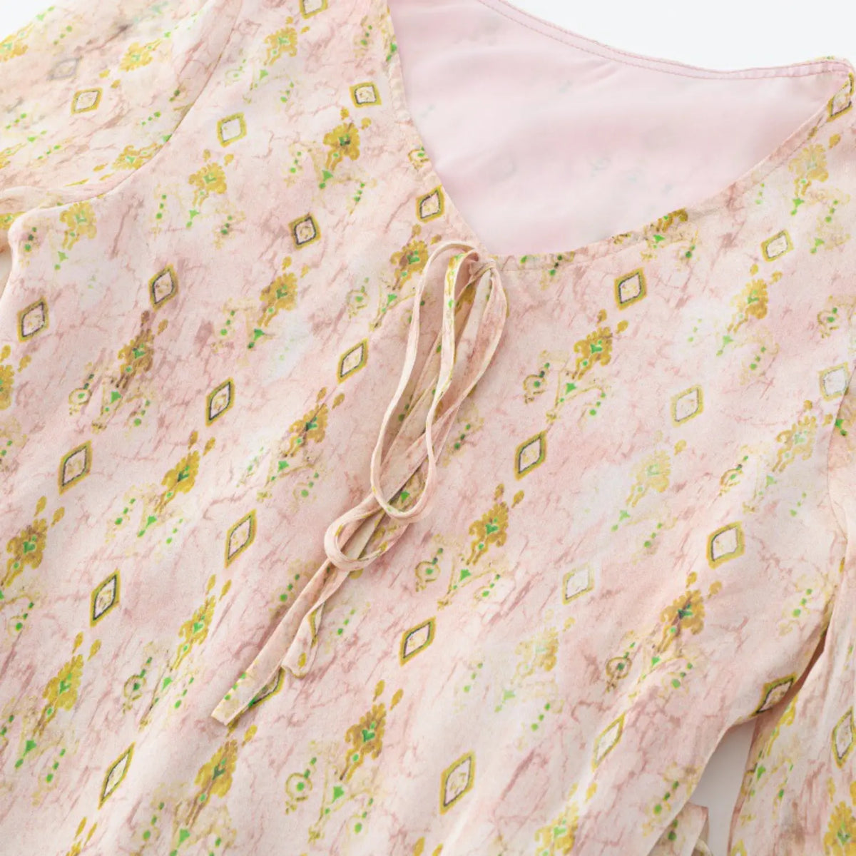 Close-up of front tie string