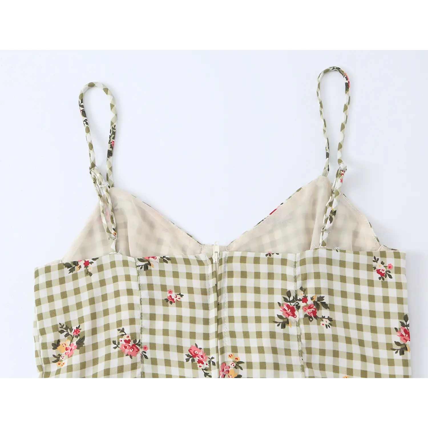 Back detail shot olive gingham floral camisole, adjustable spaghetti straps, hidden back zipper closure, full white inner lining