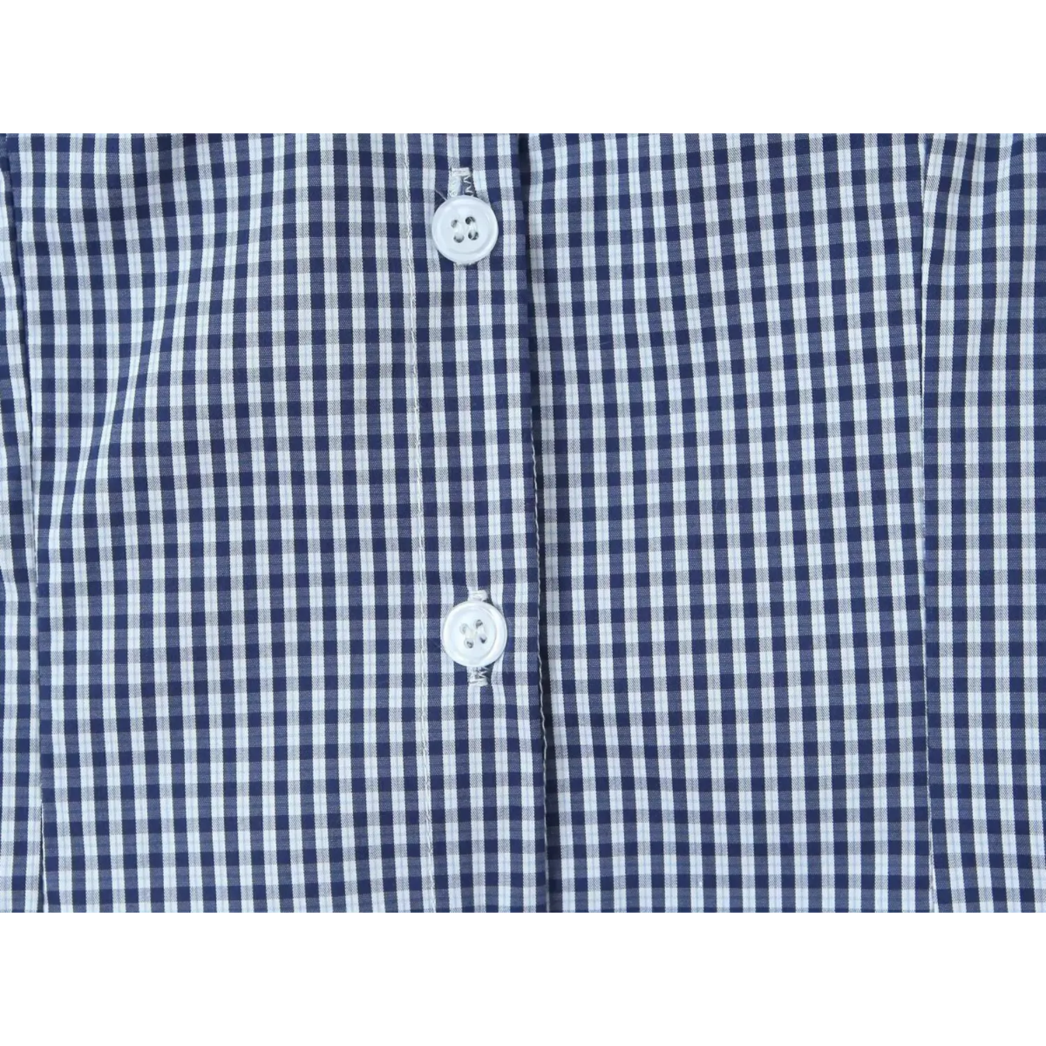 Gingham top placket white round resin button macro close-up, double secure stitching neat placket binding clear navy small check fabric texture front placket sewing craft shot
