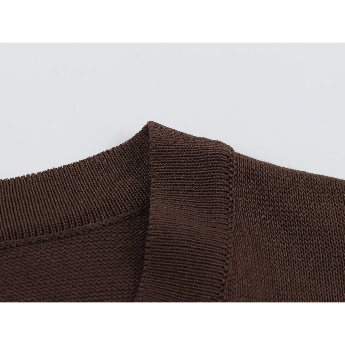 Close-up of brown ribbed collar