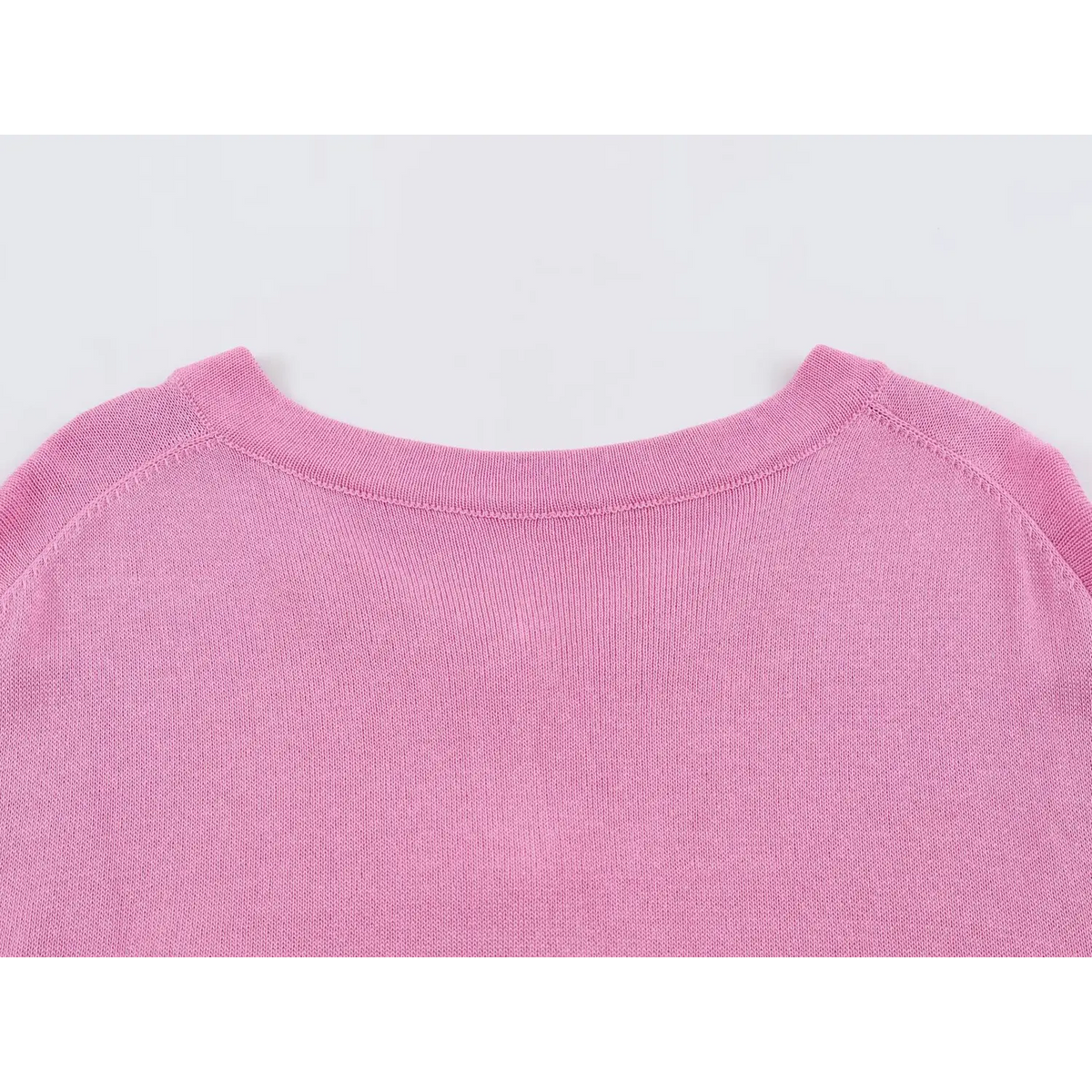 Close-up of pink back neckline