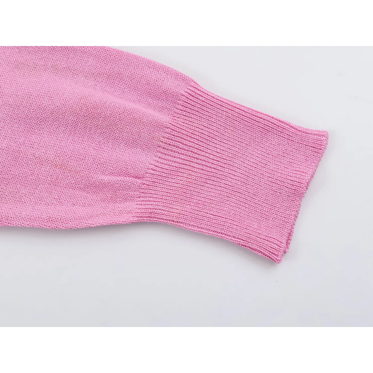 Close-up of pink ribbed cuff