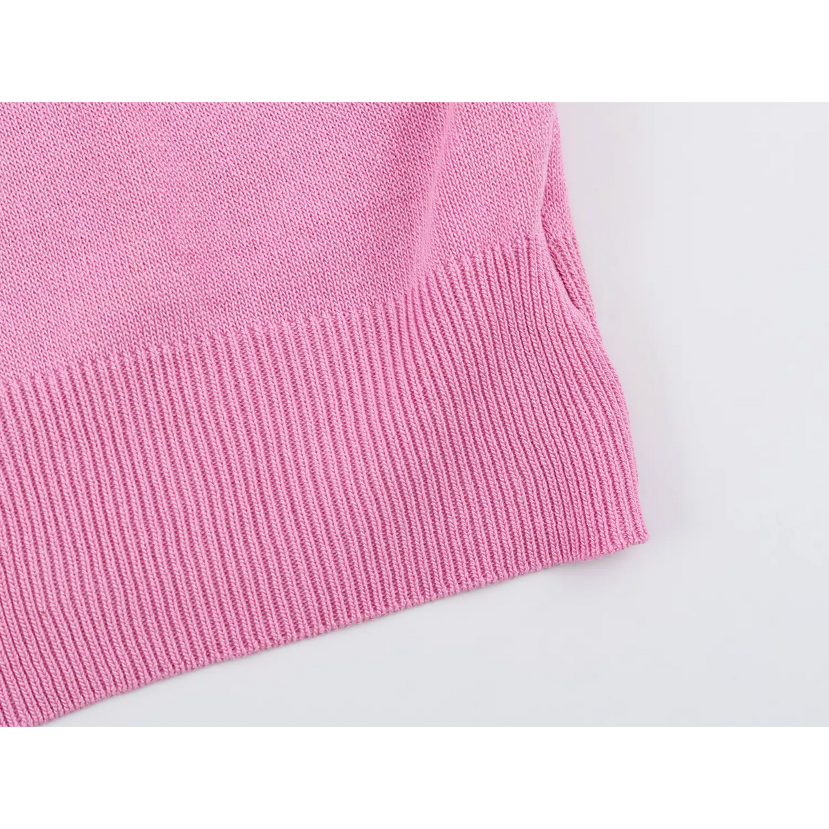 Close-up of pink ribbed hem