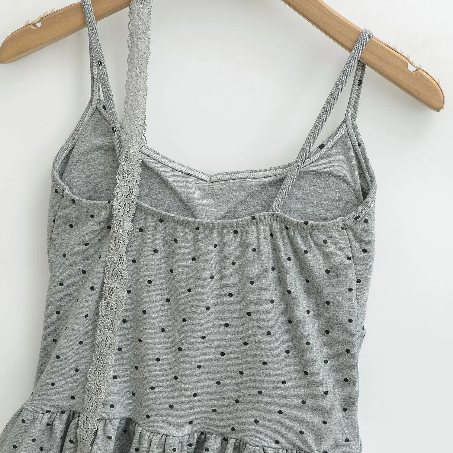 Gray black polka dot knit cami back inner flat close-up, thin printed straps elastic smocked waist square back neck knit fabric white background shot
