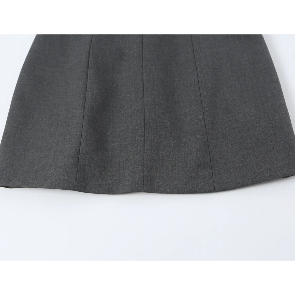 Close-up of vertical seam panels on skirt