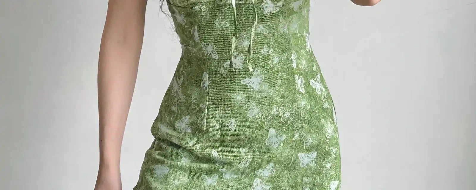Green floral butterfly print spaghetti strap mini dress hero banner for women summer