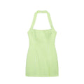 Flat lay view of a green and white gingham halter mini dress, showcasing the halter neck, square bust, and A-line silhouette.