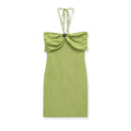 Full front view of green knit halter mini dress, featuring gathered bust and central bead detail.