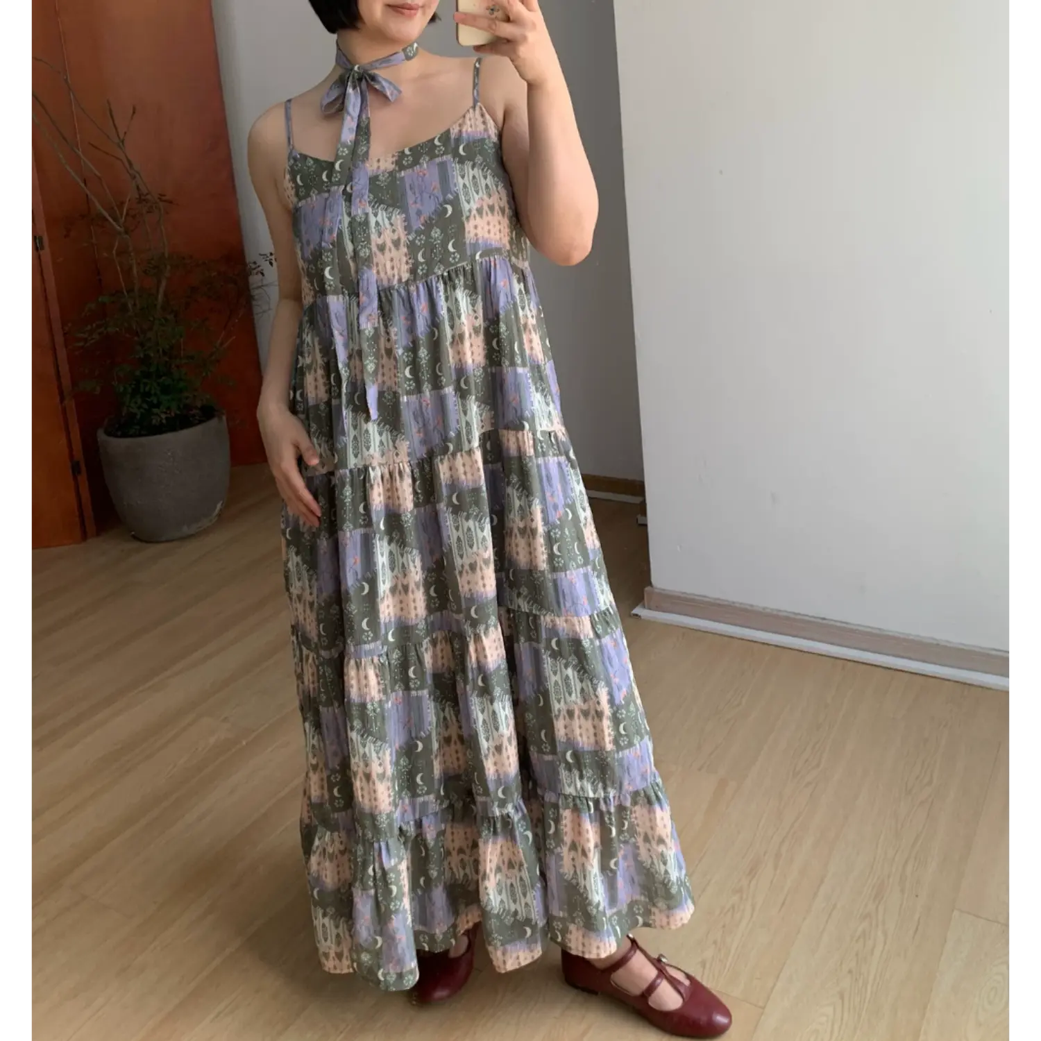 Olive base moon tree print loose cami tiered maxi dress, multi-layer ruffle hem, matching neck tie minimalist korean full body model shot