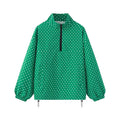 Front view isolated on white background, green white polka dot half zip pullover jacket