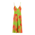 Front full view of green orange floral cami maxi dress with v‑neck