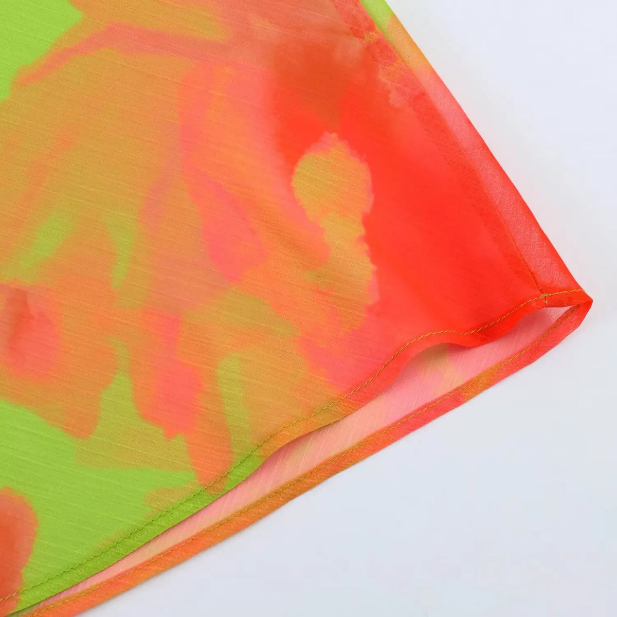 Close‑up of lightweight floral fabric and dress hem