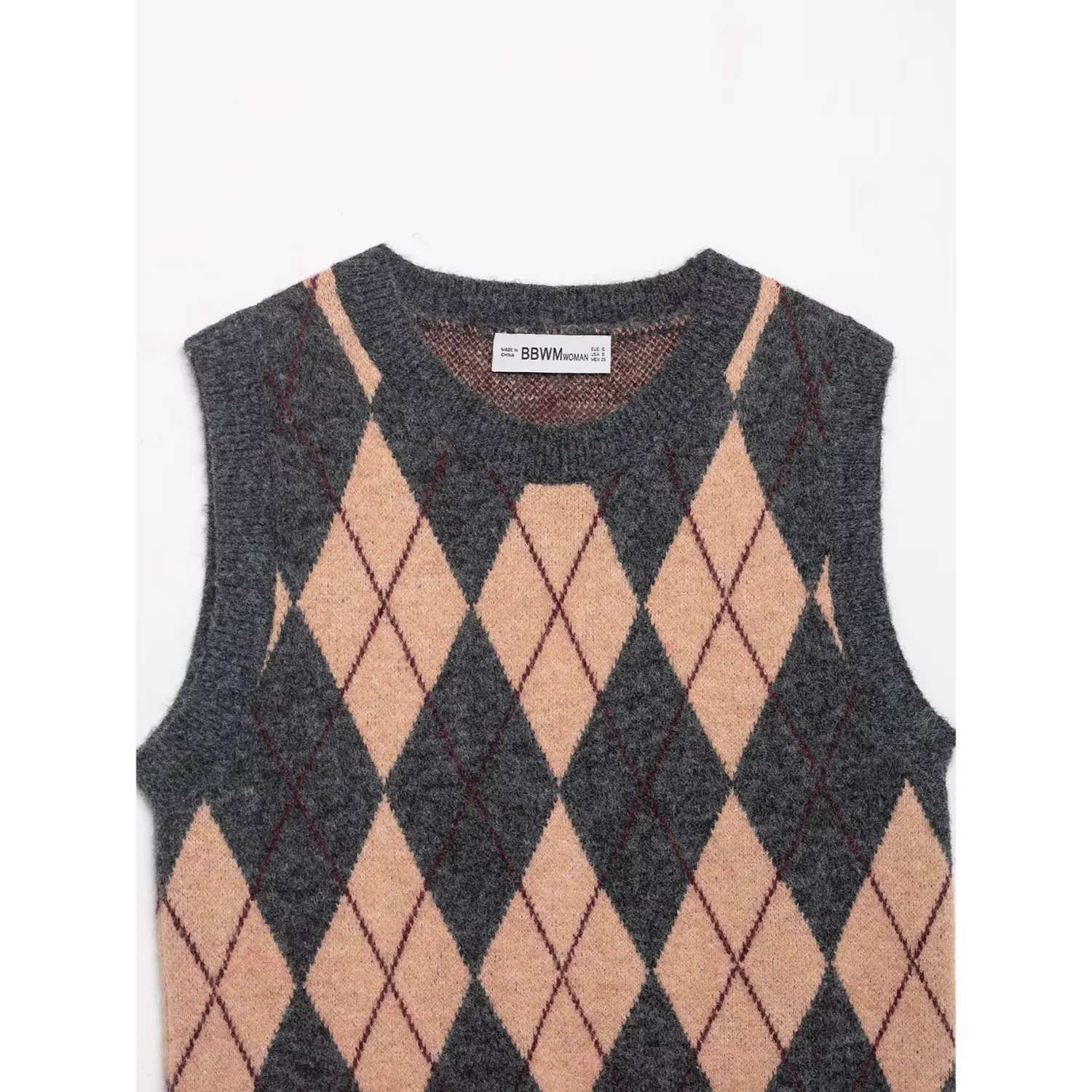 Partial front view showing the crew neckline, inner brand label, and argyle knit pattern on grey-beige vest