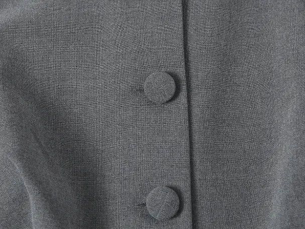 Macro close-up of fabric-covered buttons