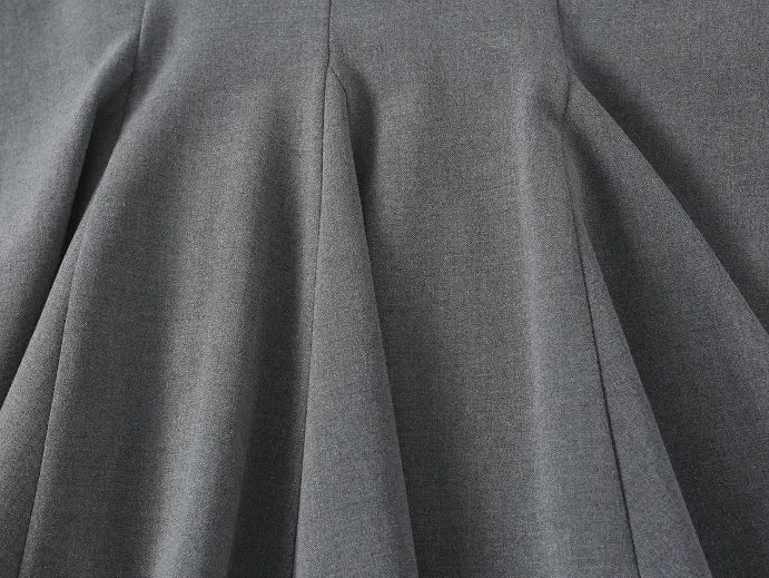 Macro close-up of suiting fabric texture and pleat