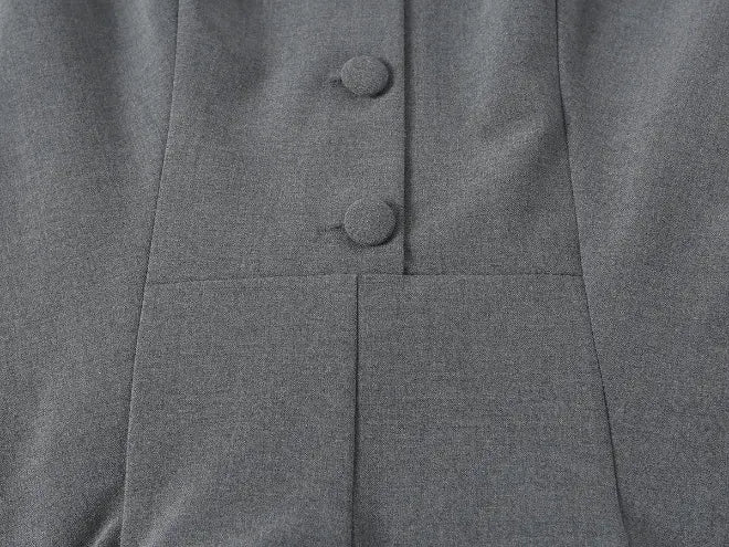 Close-up of waist seam and button placket