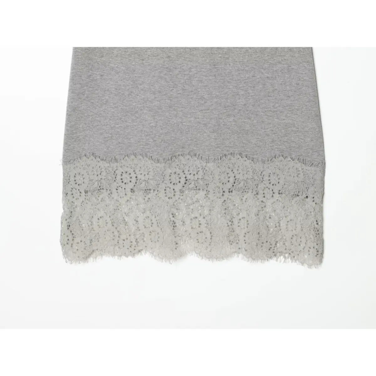 Hem view of the grey cami dress, showing the delicate scalloped lace trim and soft knit base fabric
