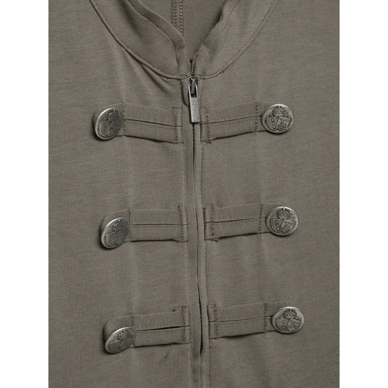 Close‑up collar and zipper area grey military top, stand neckline, central zipper, dual rows vintage metal crest buttons