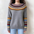 Female model wears grey fairisle sweater, colorful geometric jacquard on yoke and long sleeves, crew neck casual knit pullover