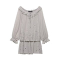 Flat‑lay front view grey off‑shoulder mini dress, ruffle neckline, tie‑knot detail, gradient silver sequins, long ruffle cuff sleeves