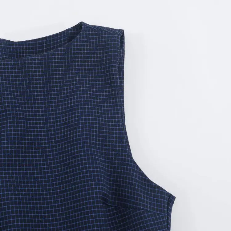 Close-up of armhole and check fabric