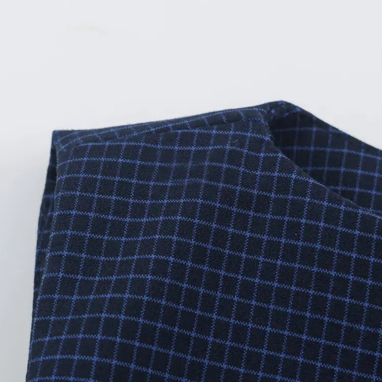 Macro close-up of grid check fabric texture