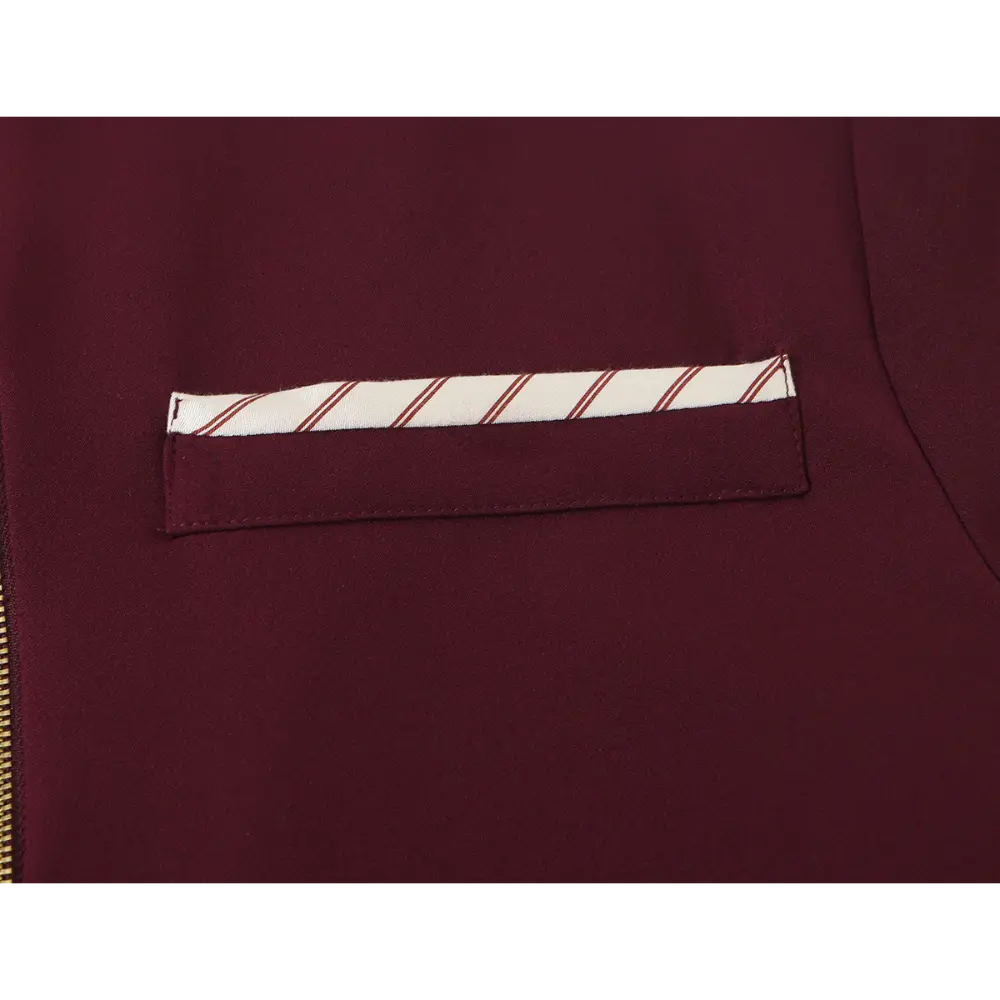 Close-up of chest pocket with striped trim