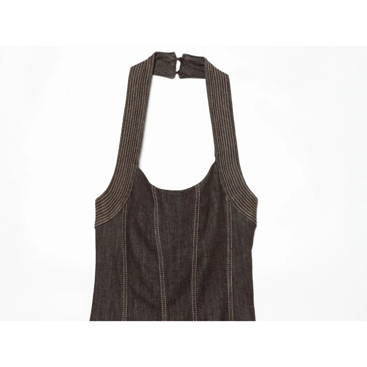 Close‑up of halter neckline, button closure and contrast stitching on dark brown denim maxi dress