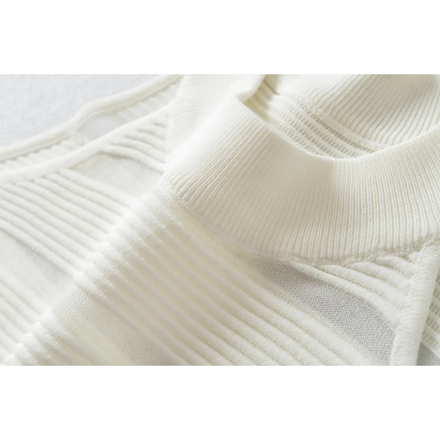 Ivory halter knit dress neck macro shot, high stretch vertical rib knit tight crew neck binding fine breathable knit fabric detail shot