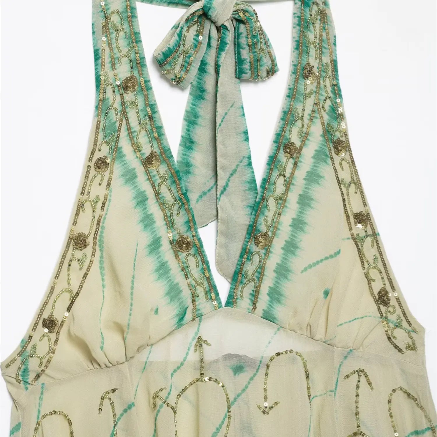 Front halter neck partial macro shot, dense golden bead & floral sequin trim along V-neck edge, tie-dye chiffon