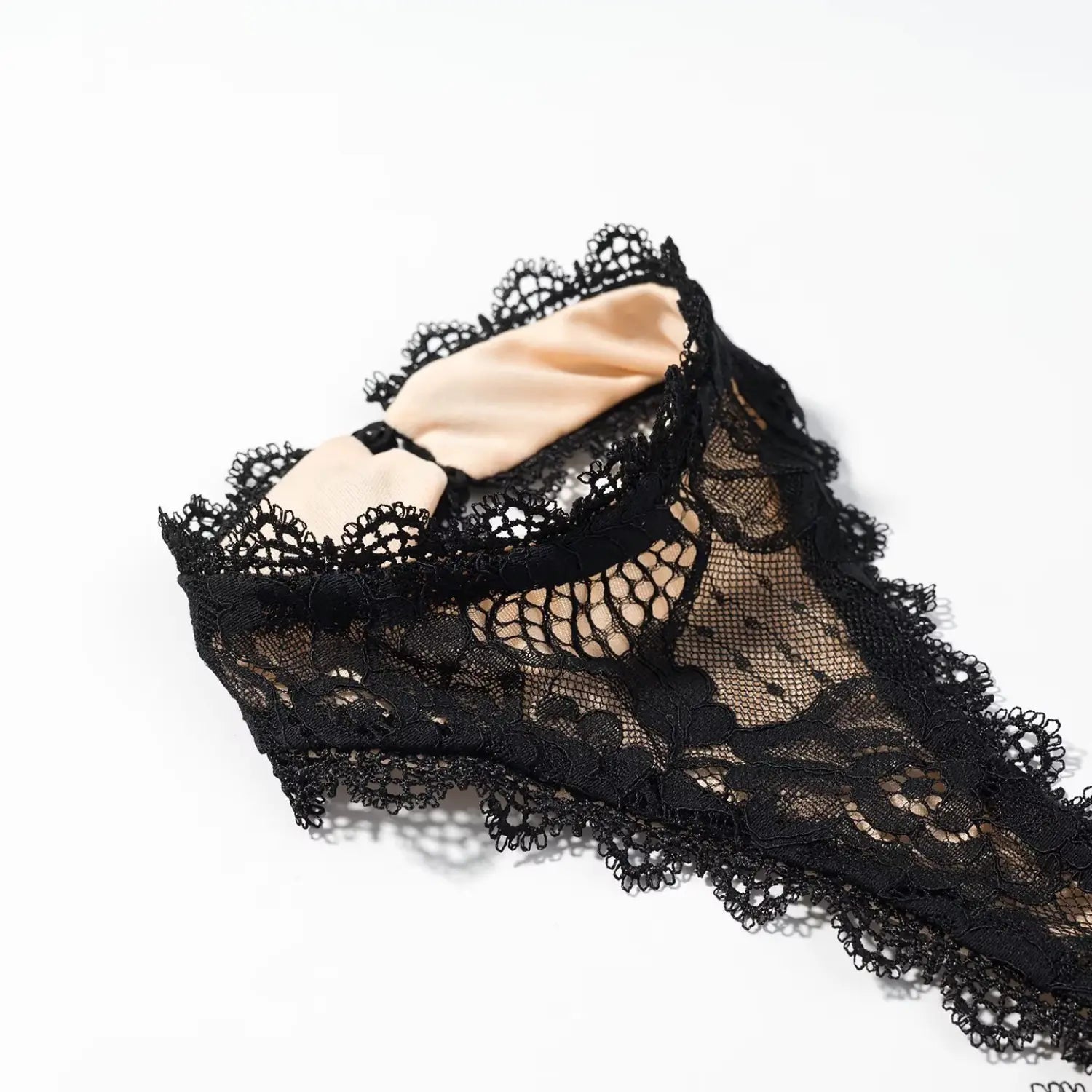 Halter neck scallop eyelash lace button collar macro close-up, eyelash trim fabric binding back button closure craft detail shot