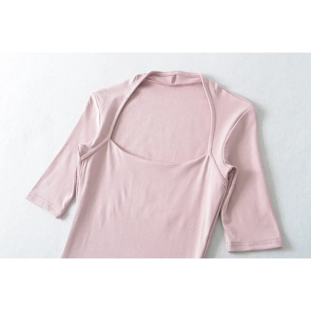 Full front view on white background of the pink halter square-neck mid-sleeve top