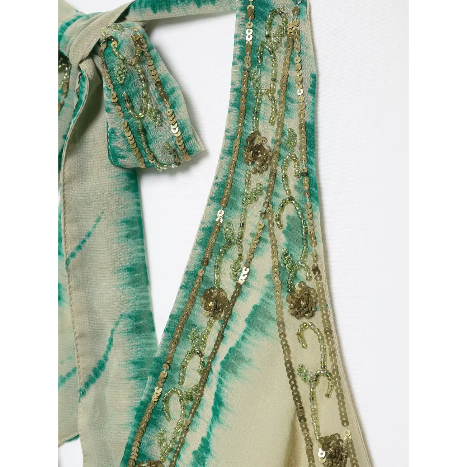 Halter strap full length macro shot, continuous decorative bead piping, tie-dye striped chiffon fabric