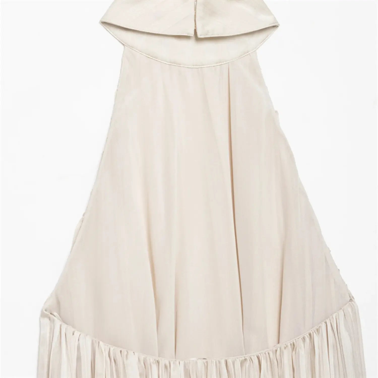 Back partial shot showing solid inner lining separate from outer pleated shell, waist gathered transition seam