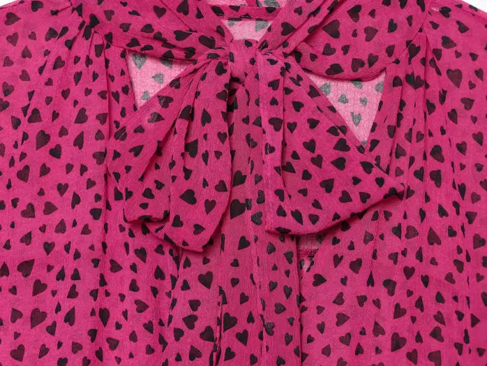 Macro close-up of heart print bow knot