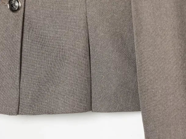 Close-up of princess seam and cropped hem stitching