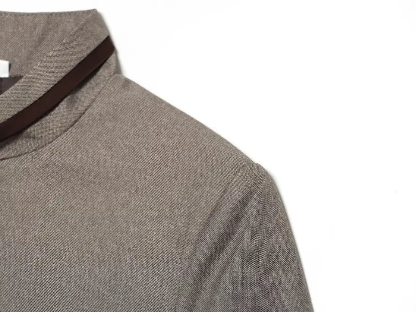 Close-up of shoulder seam and collar contrast trim