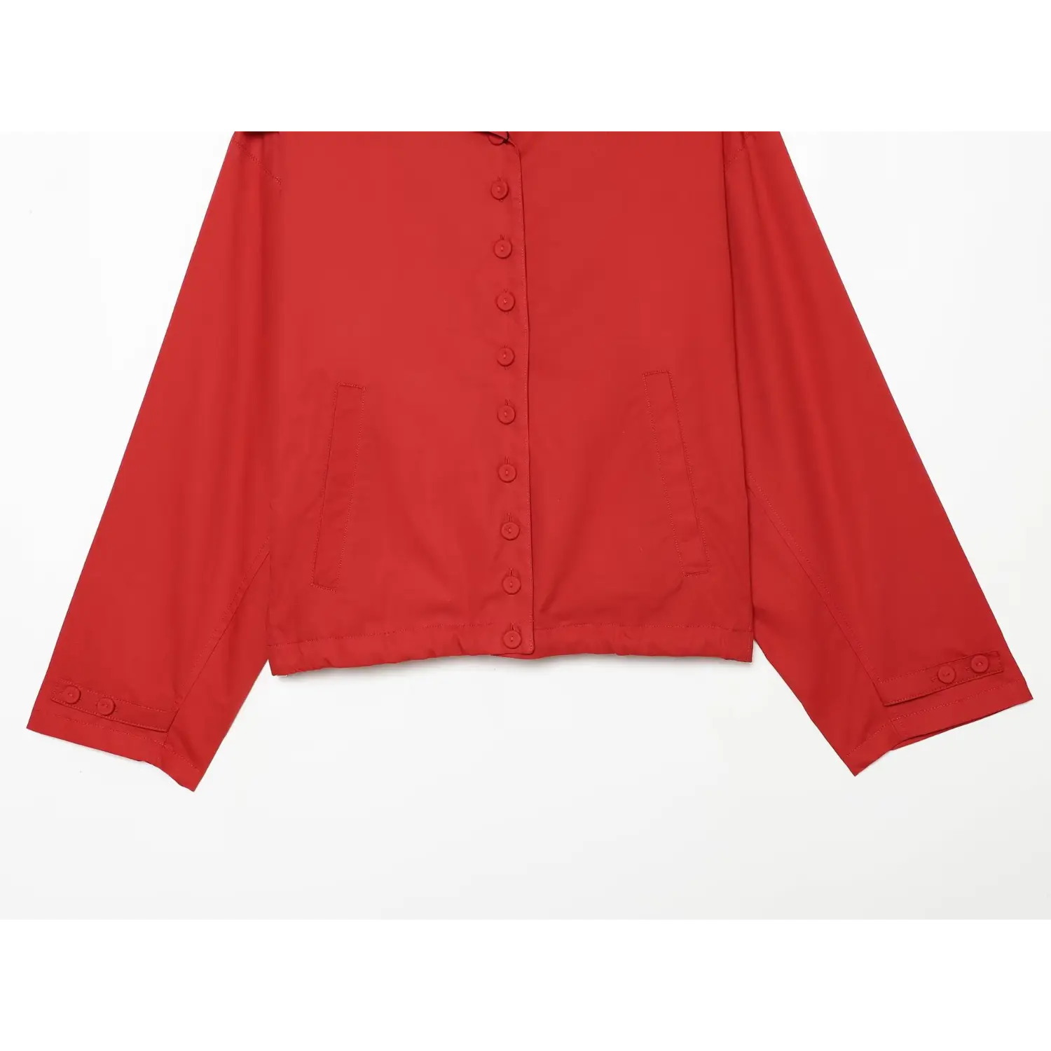 Jacket hem side pocket flat shot, symmetric square patch pockets neat stitching long sleeve double button cuffs cropped length full silhouette shot