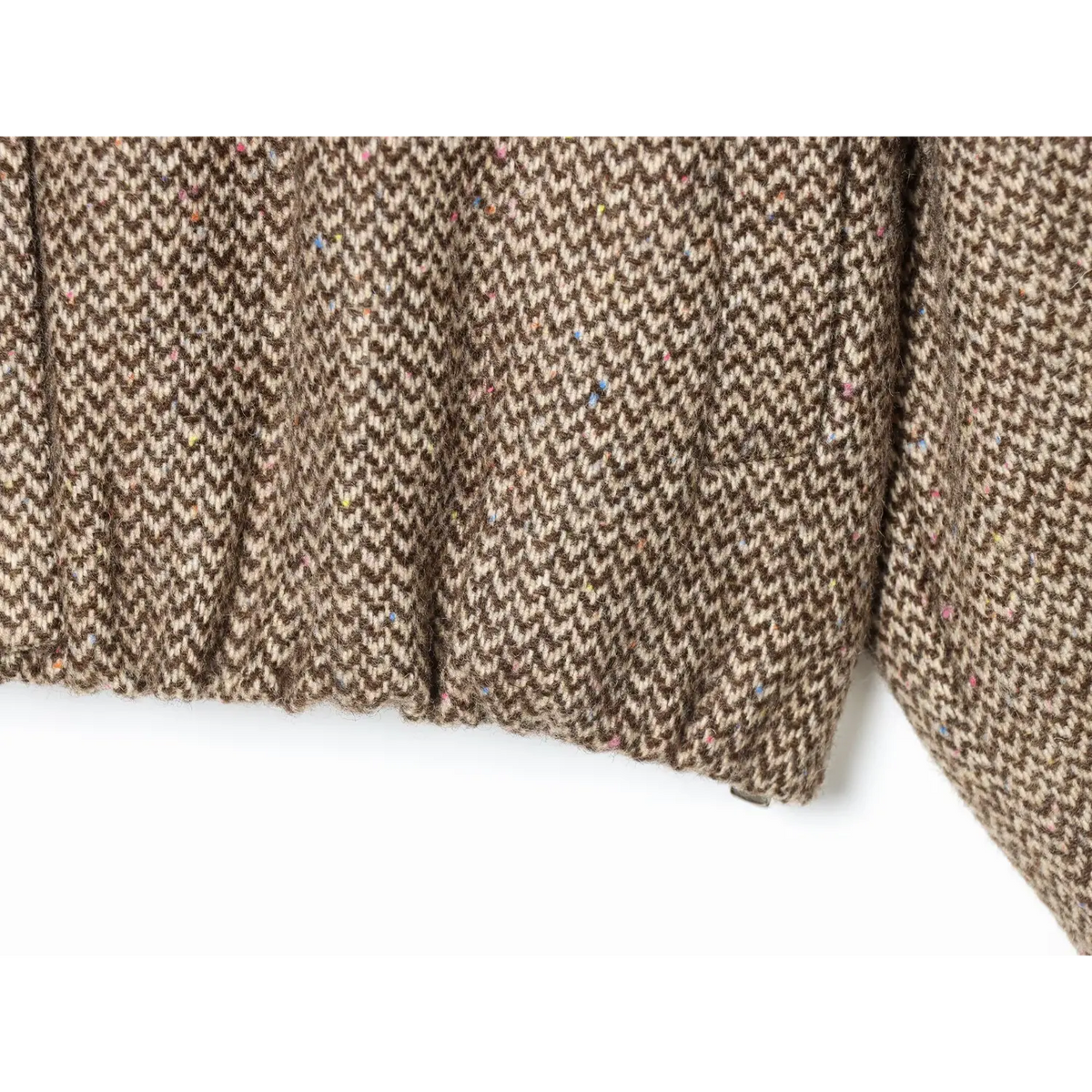 Close-up of herringbone tweed fabric texture