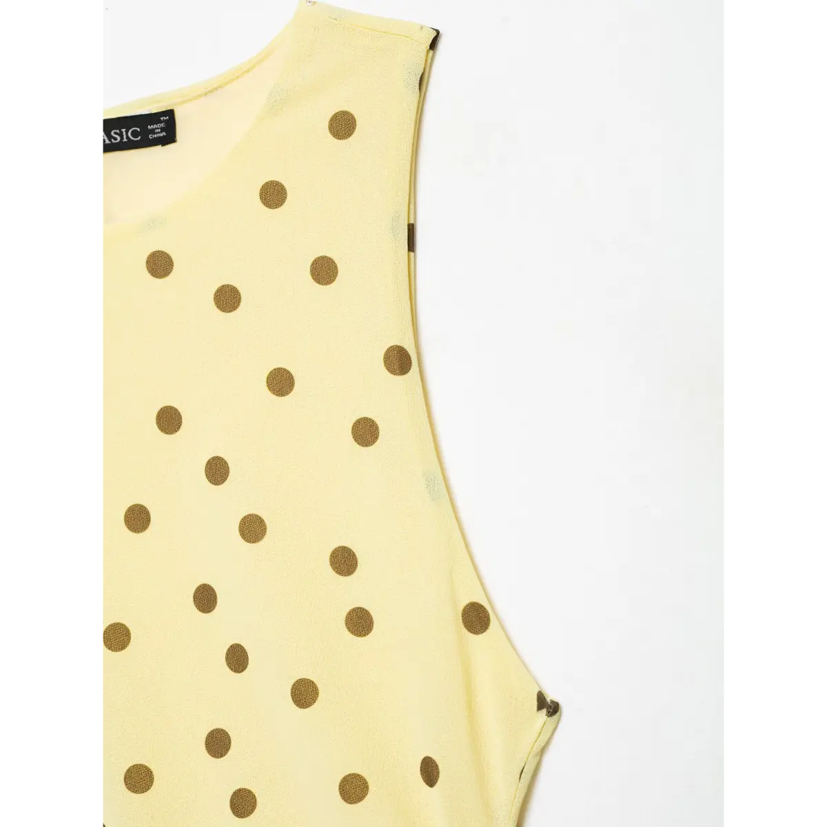 Armhole trim detail sleeveless halter neck polka dot chiffon garment