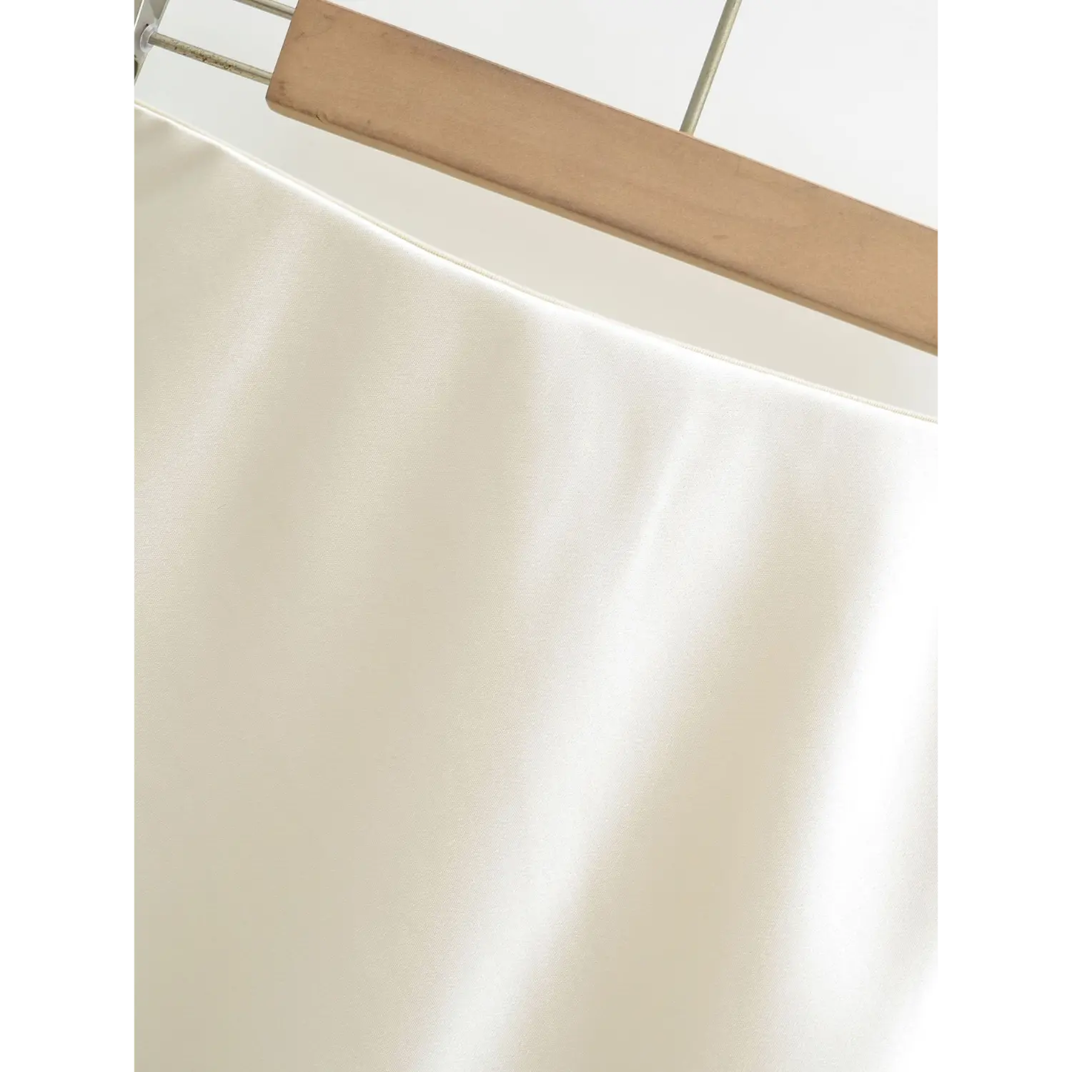 High waistband satin texture flat macro shot, smooth water light satin soft sheen neat waist stitching wrinkle-resistant drape fabric shot