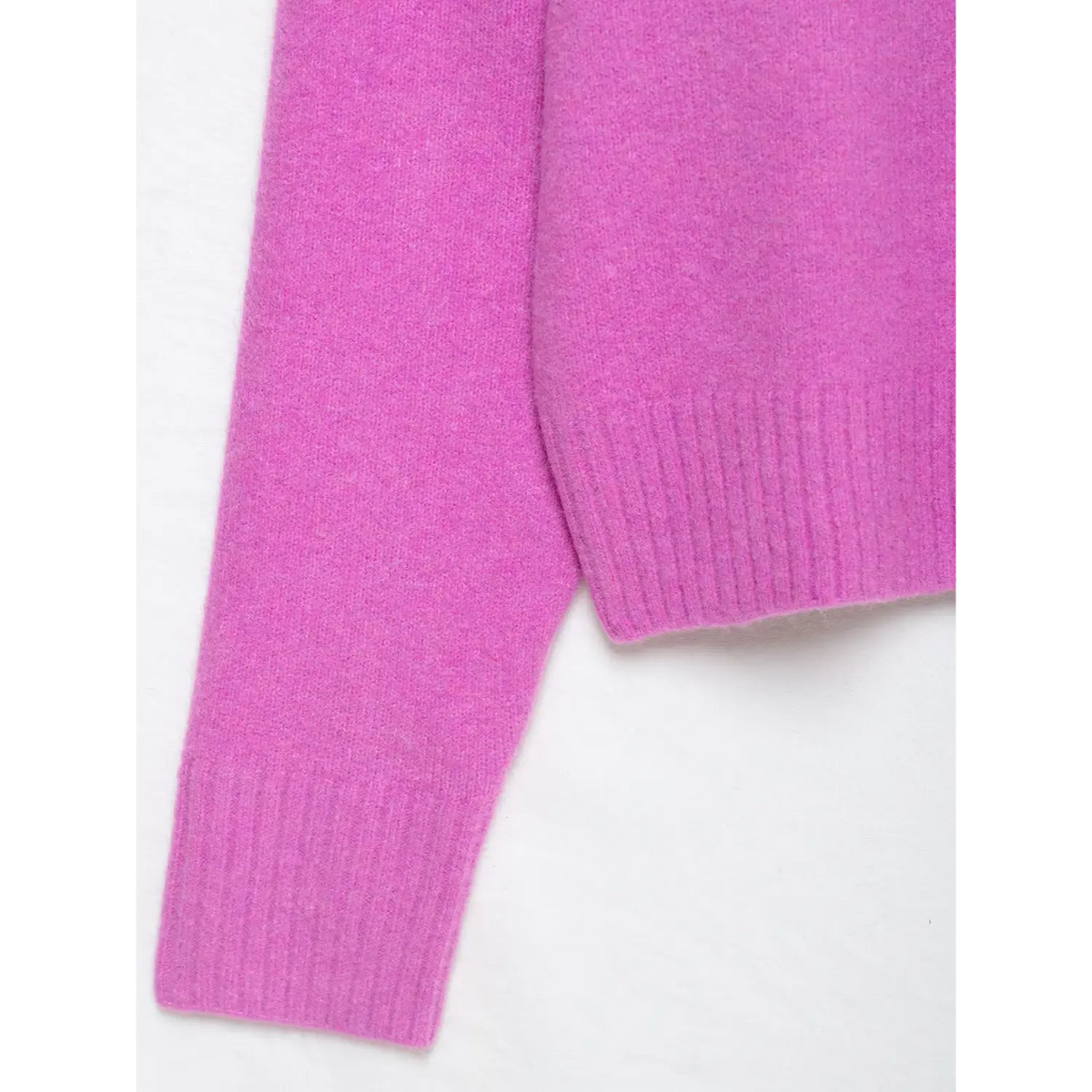 Close-up of ribbed cuff and hem