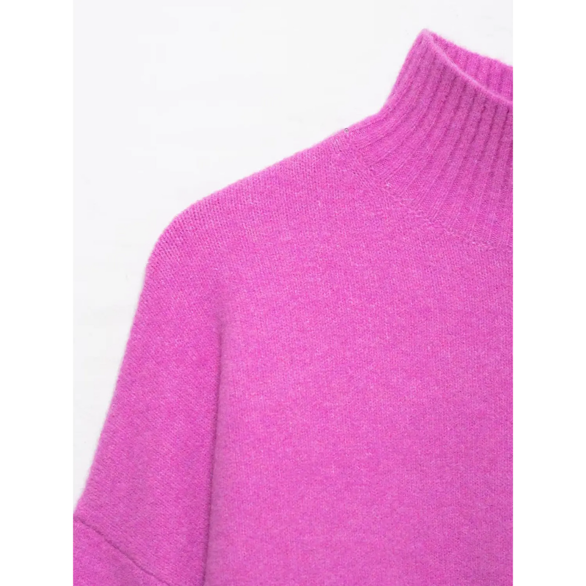 Close-up of drop shoulder and mock neck