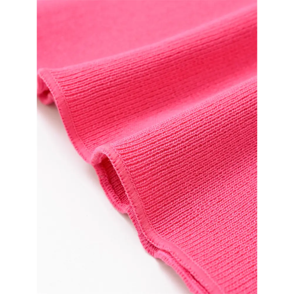 Close-up of ribbed knit texture at hem