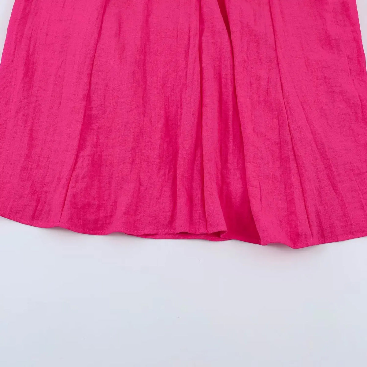 Close-up of A-line skirt panels and vertical seams