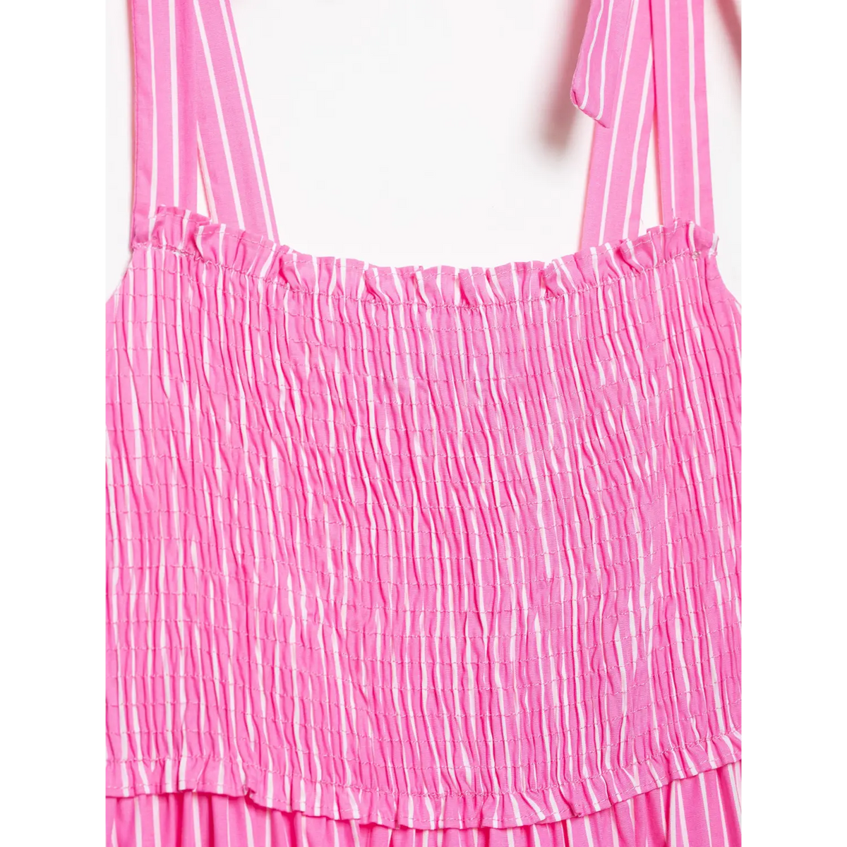 Close‑up of fabric tie bow shoulder strap side detail