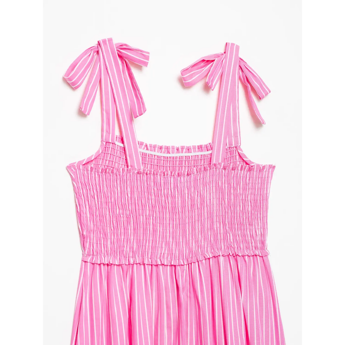 Close‑up of smocked elastic square neck bodice detail