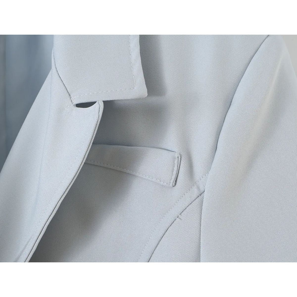 Close-up of chest flap pocket and lapel