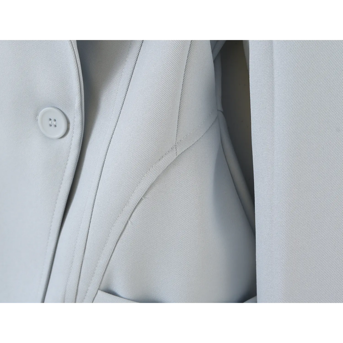 Close-up of princess seam and button placket